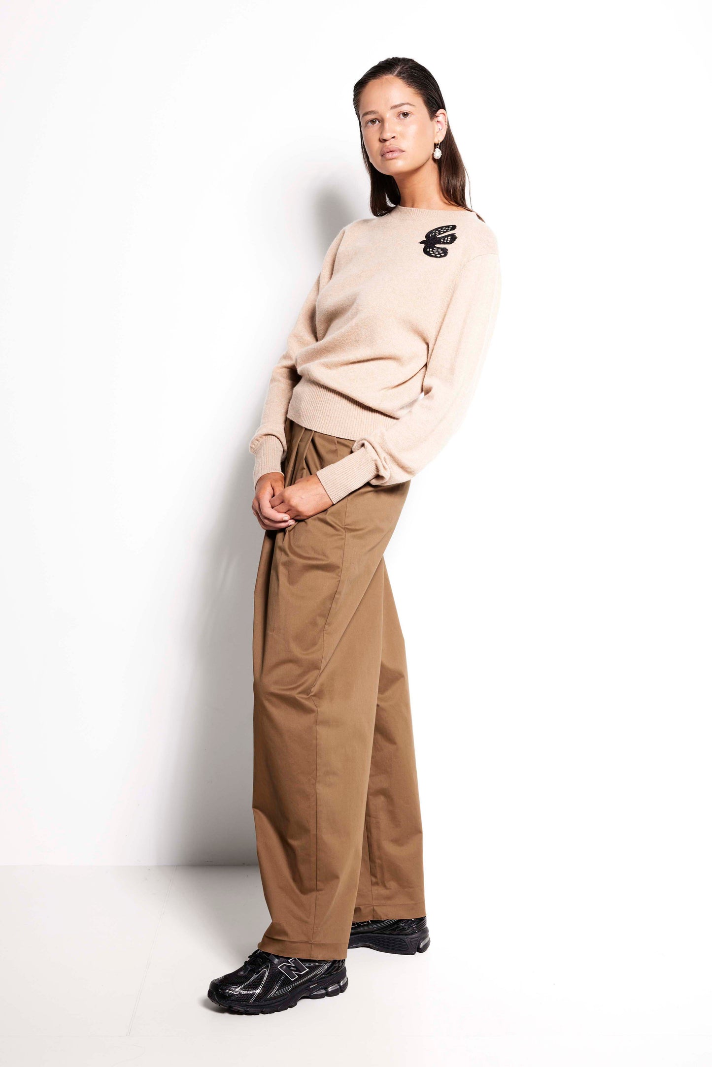 Swallow Cashmere Crew – Beige long sleeve crew neck jumper with black embroidery detail