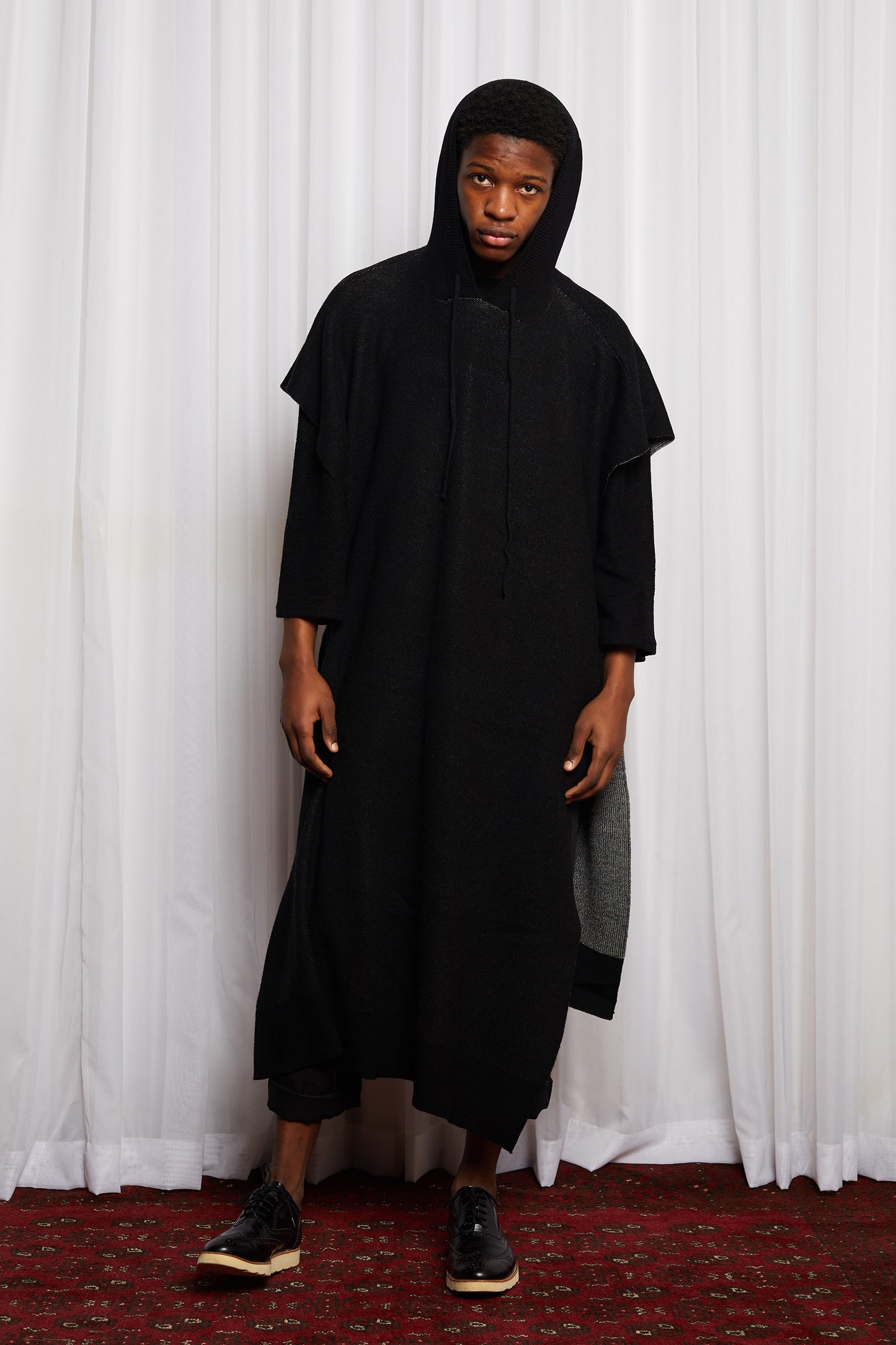 SCIFI PONCHO - BLACK MERINO KNIT