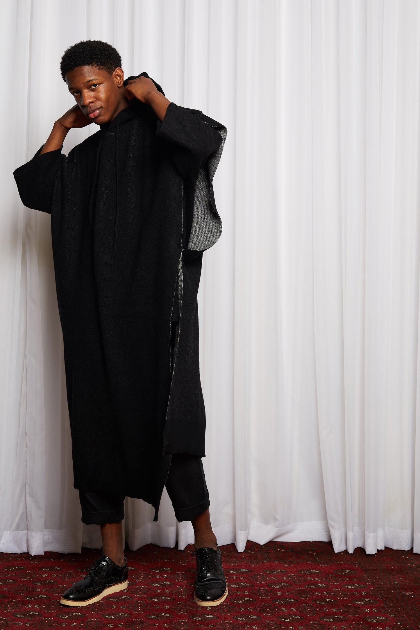 SCIFI PONCHO - BLACK MERINO KNIT