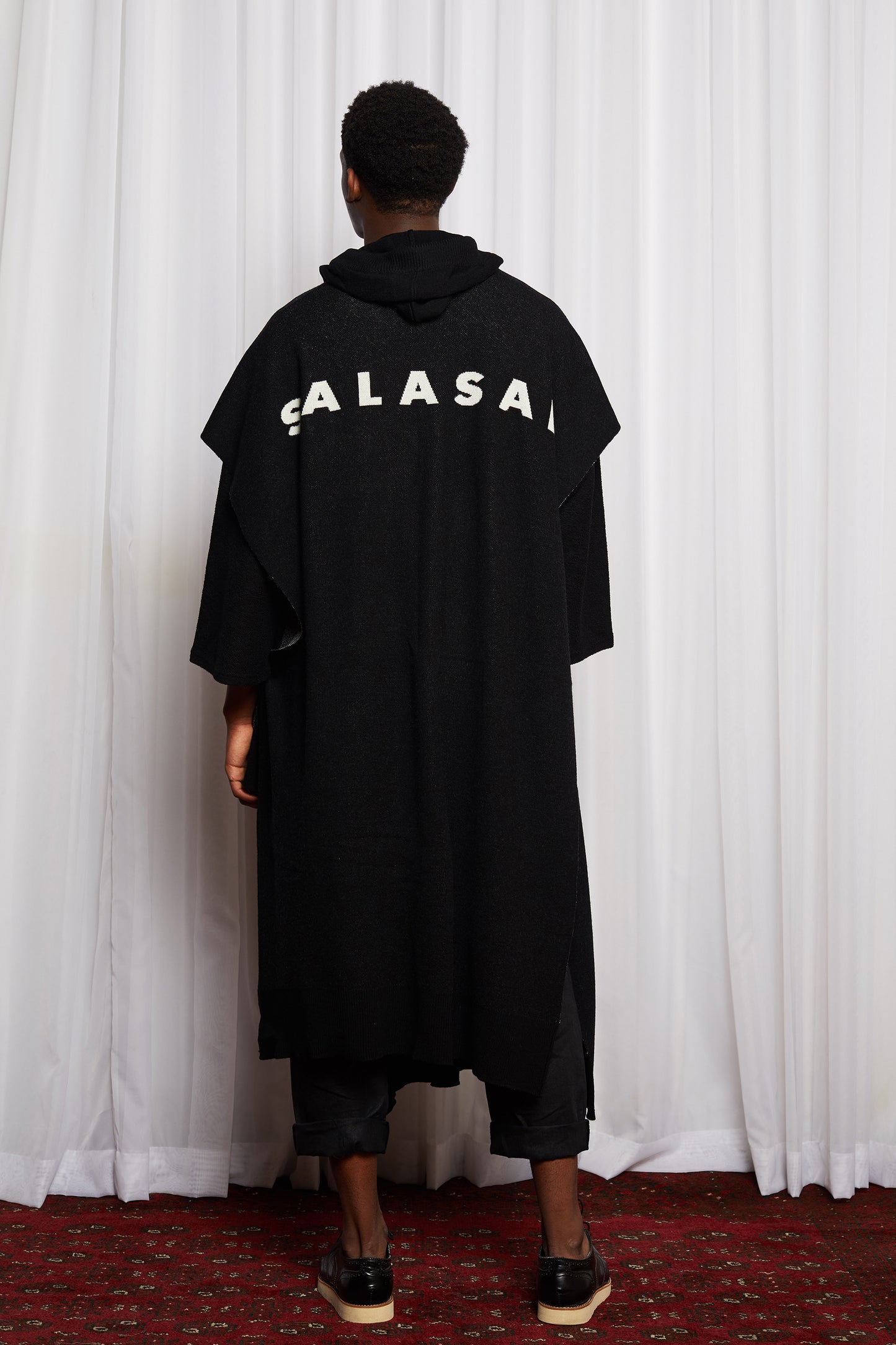 SCIFI PONCHO - BLACK MERINO KNIT