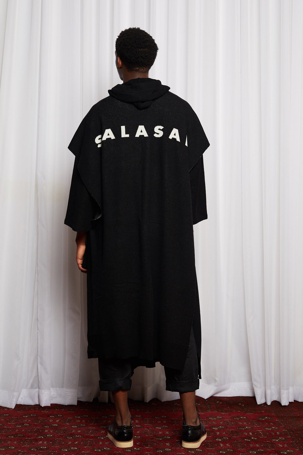 SCIFI PONCHO - BLACK MERINO KNIT